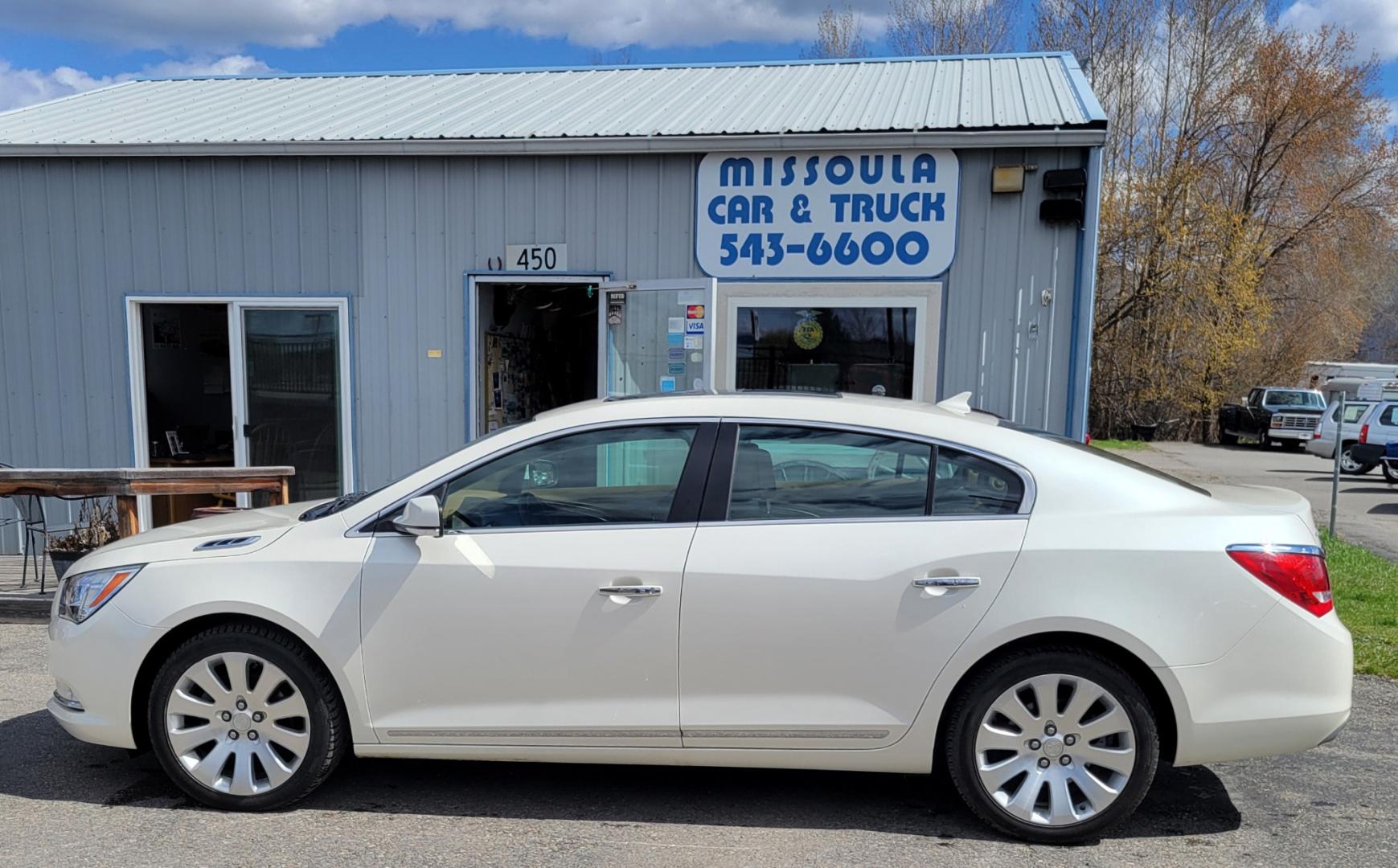 2014 Pearl White /Brown Buick LaCrosse PREMIUM (1G4GE5G33EF) with an 3.6L V6 engine, 6 Speed Auto transmission, located at 450 N Russell, Missoula, MT, 59801, (406) 543-6600, 46.874496, -114.017433 - Beautiful AWD Luxury Sedan. 3.6L V6 Engine. 6 Speed Automatic Transmission. Power Sunroof. Leather Heated Seats. Bluetooth. Memory Seats. Air. Cruise. Tilt. Power Windows and Locks. AM FM XM CD. Bose Sound. Remote Start. Adaptive Cruise Control. - Photo#4